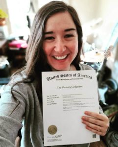 Kara Long, of The Memory Collective, holds her first trademark.